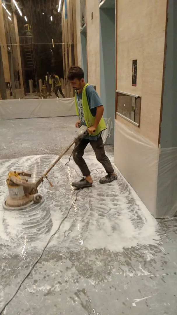 Professional tile polishing in progress